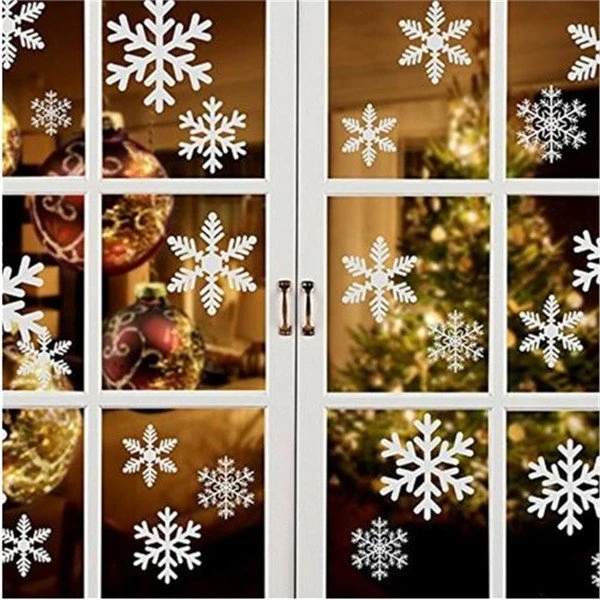 Fenêtre décorée de flocons, visuel associé à …Itinérance.